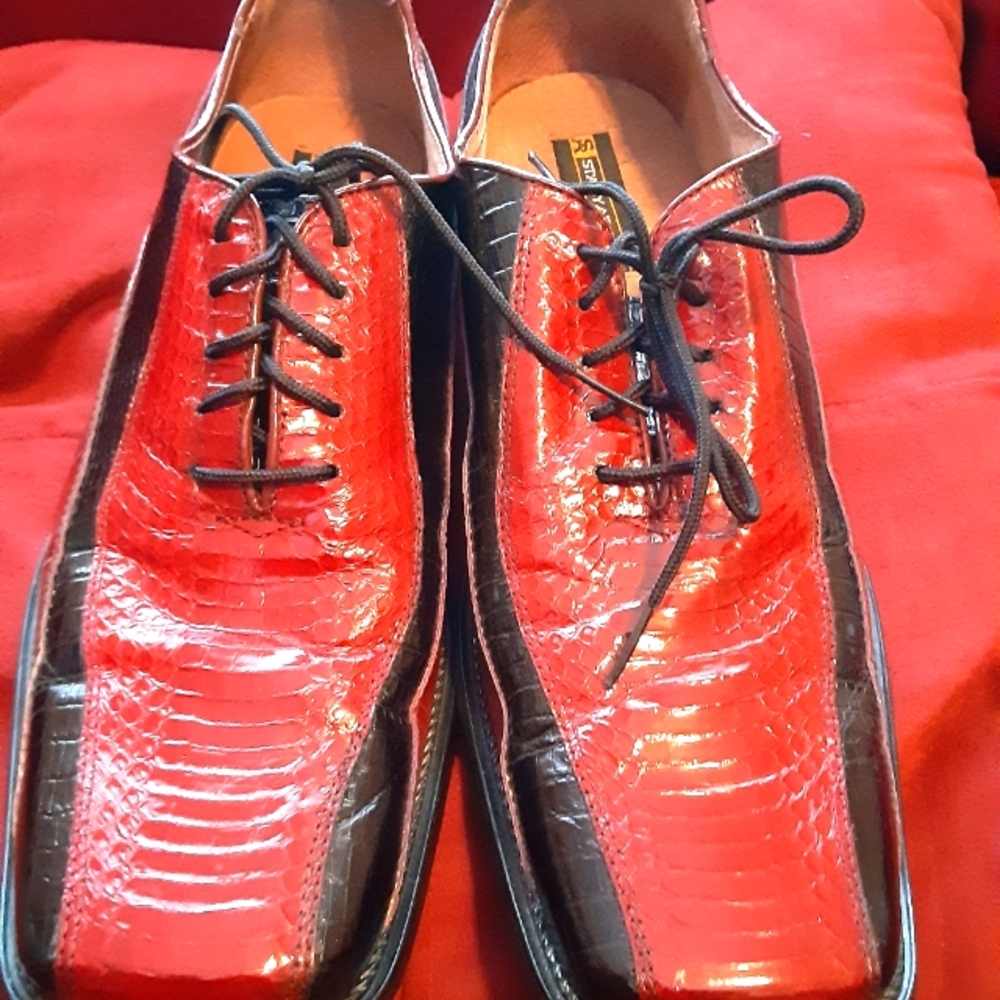 Stacy Adams leather red and blue string up dress shoes.